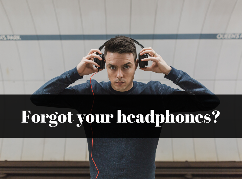 Man taking off headphones at the gym