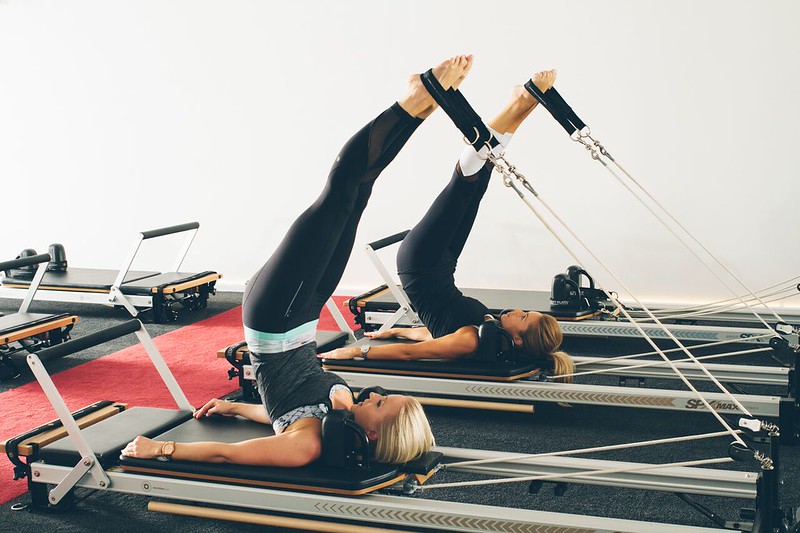 Woman on pilates reformer